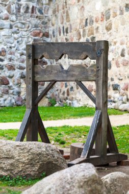 Wooden medieval torture device clipart