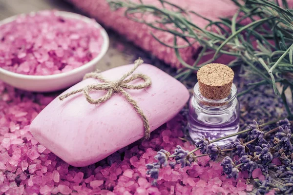 Bar of homemade soaps, sea salt, essential oil and dry lavender — Stock Photo, Image