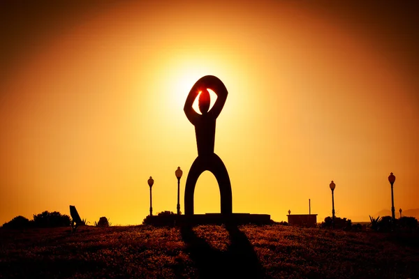 A copy of the Colossus of Rhodes at sunset — Stock Photo, Image