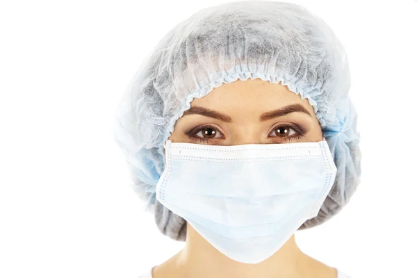 Female doctor in a mask closeup. — Stock Photo, Image