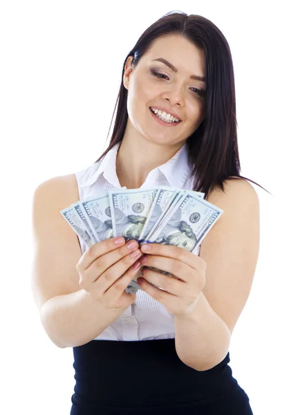Zakenvrouw kijkt een fan van geld in de handen. — Stockfoto