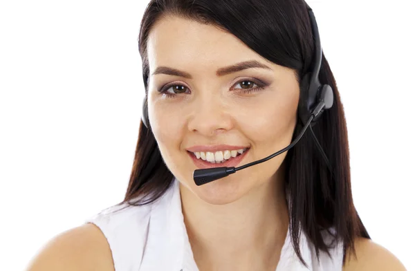 Schöne Sekretärin mit Headset. Nahaufnahme — Stockfoto