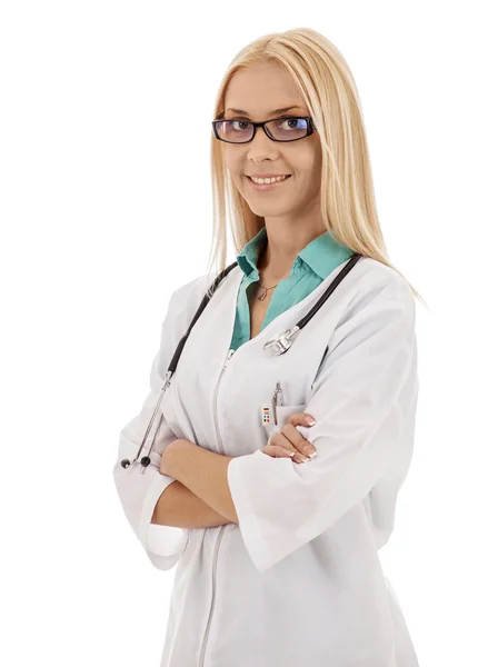 Blonde schöne Ärztin mit Brille schaut in die Kamera, lächelt Stockbild