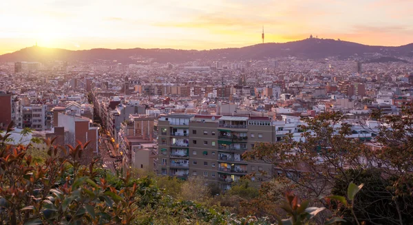 View over city in sunset. — Stock Photo, Image