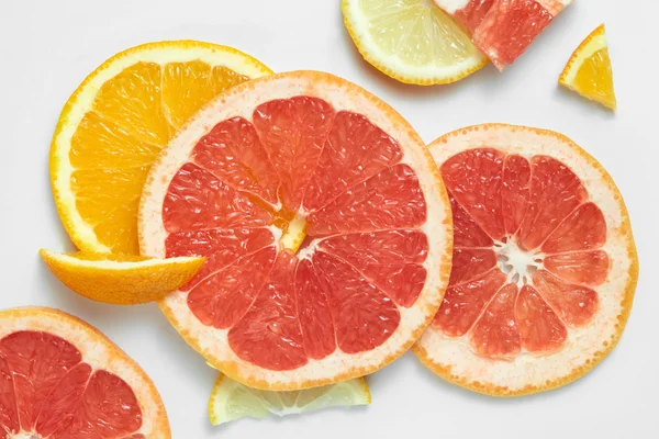 Mix fresh sliced orange, lemon and grapefruit — Stock Photo, Image