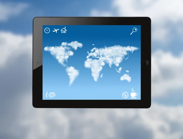 Tablet pc with world map made of clouds — Stock Photo, Image