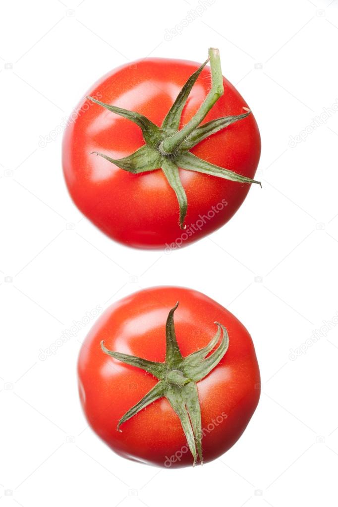 two red tomatoes isolated on white