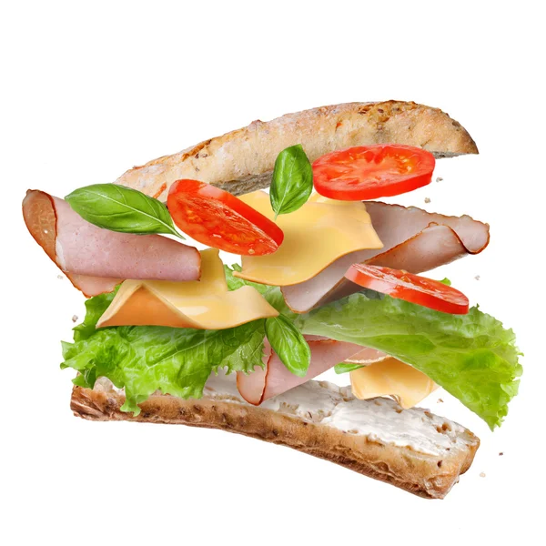 Sandwich with falling ingredients in the air — Stock Photo, Image