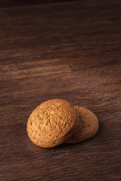 Cookie-uri de ovăz pe masă de lemn — Fotografie, imagine de stoc