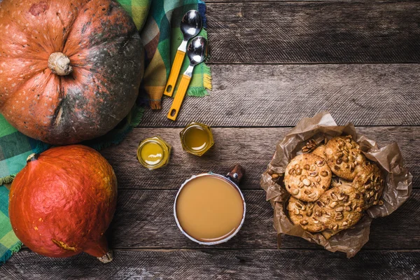 Pumpkins, soup, honey and cookies — Stock Photo, Image