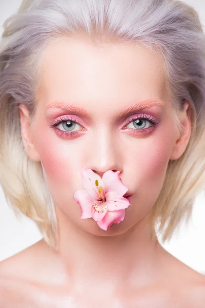 Blonde girl with flower — Stock Photo, Image