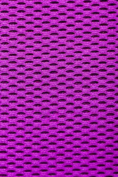Синтетическая пурпурная ткань. сетка крупным планом. macro — стоковое фото