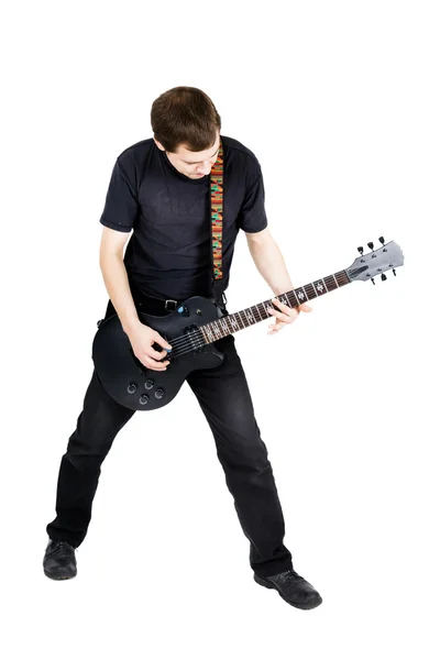 Young man with an electric guitar. Isolated — Stock Photo, Image