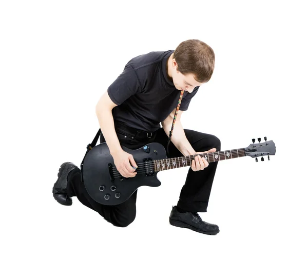 Jonge man met een elektrische gitaar. Geïsoleerd — Stockfoto