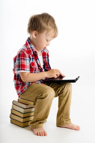 Boy with a Tablet PC. studio — Stock Photo, Image