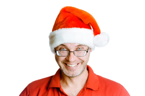 Smiling happy unshaven man with glasses and a hat Santa — Stock Photo, Image