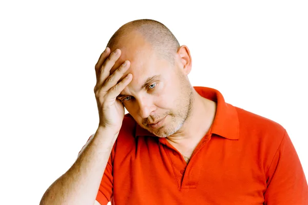 Unshaven middle-aged man holding his head. Headache. Studio. iso — Stock Photo, Image