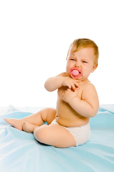 Upset baby in diapers. Studio — Stock Photo, Image