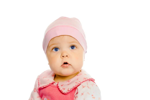 Baby flicka i en rosa klänning och hatt. Porträtt. Studio. Isolerade. — Stockfoto