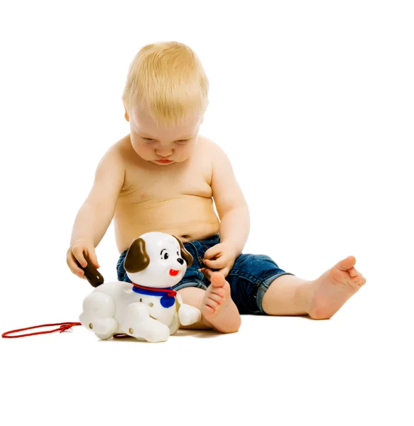 Baby boy playing with toys. isolated — Stock Photo, Image