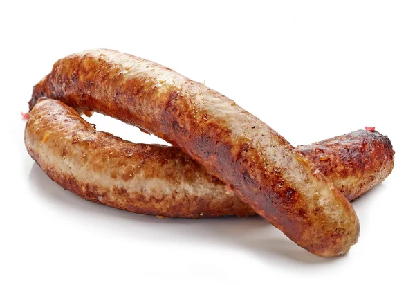 Saucisses grillées sur fond blanc — Photo