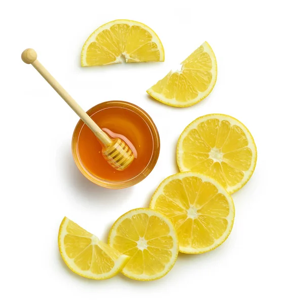 Zitronenscheiben Und Honig Isoliert Auf Weißem Hintergrund Draufsicht — Stockfoto