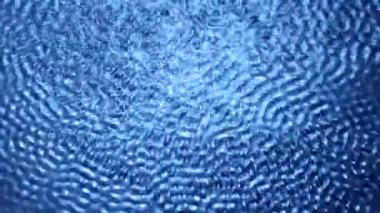 Su yüzeyindeki ses dalgaları yakın plan. su arkaplanı