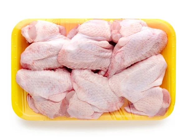 Kip vlees pakket op witte achtergrond — Stockfoto