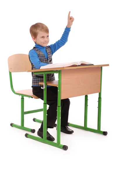 Boy raising hand to ask question — Stock Photo, Image