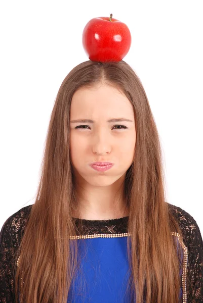 Girl keeps on head a apple — Stock Photo, Image