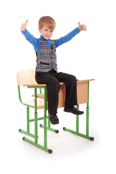 Boy Success. Niño sentado en el escritorio de la escuela —  Fotos de Stock