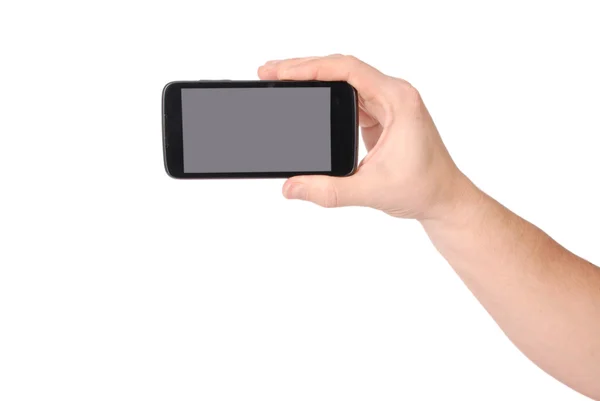 Mann hält das Smartphone in der Hand — Stockfoto