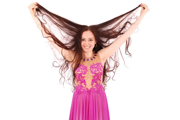 Girl playing hair in evening dress — Stock Photo, Image