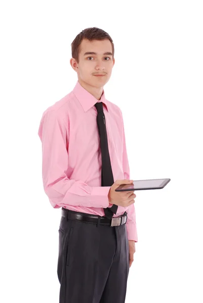 Menino de camisa sentado e segurando um tablet PC — Fotografia de Stock