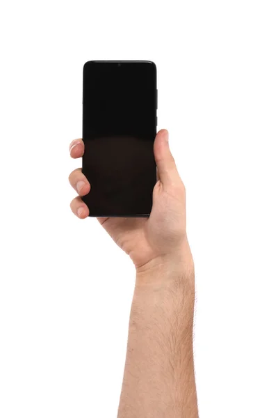 Mężczyzna Trzyma Czarny Smartfon Pustym Ekranem Izolowany Białym Tle Zdjęcie — Zdjęcie stockowe