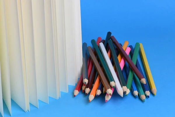 Side View Workplace Pencils Notebook Blue Background High Resolution Photo — Stock Photo, Image