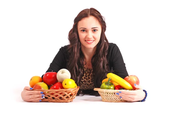 Young girl with a fruit basket — Stock Photo, Image