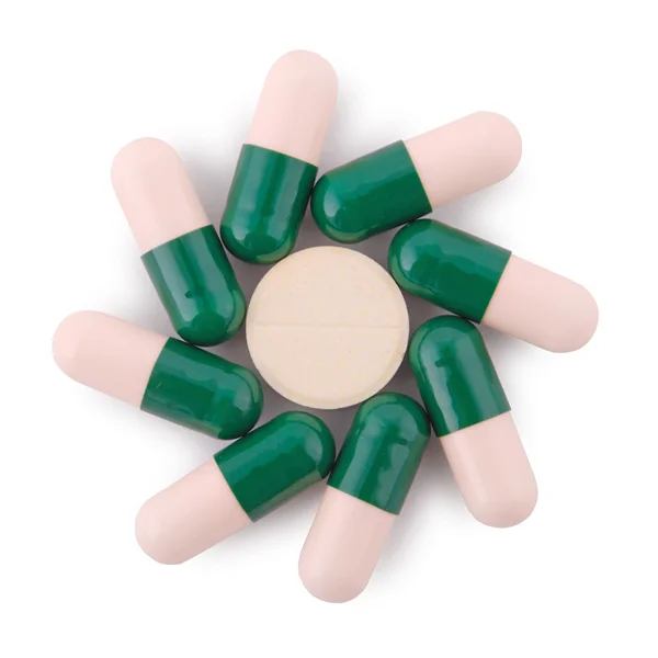 Pills from bottle on the white (Clipping path) — Stock Photo, Image