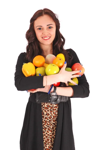 Дівчина-підліток тримає в руках фрукт — стокове фото
