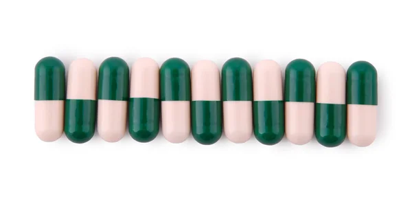 Pills from bottle on the white (Clipping path) — Stock Photo, Image
