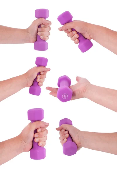 Sechs rosa Kurzhanteln in der Hand (sechs Clipping-Pfade) — Stockfoto