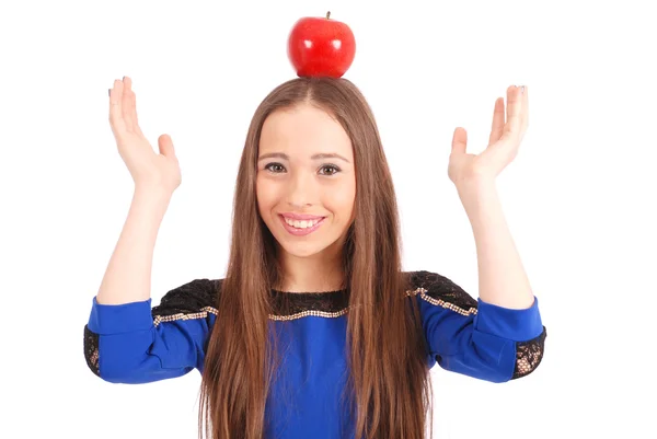 Flicka håller på huvudet en apple — Stockfoto