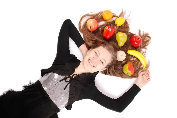 Menina segurando frutas frescas — Fotografia de Stock