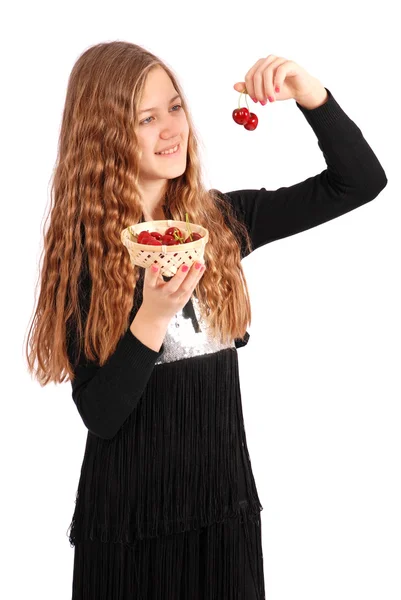 Menina segurando cerejas frescas — Fotografia de Stock