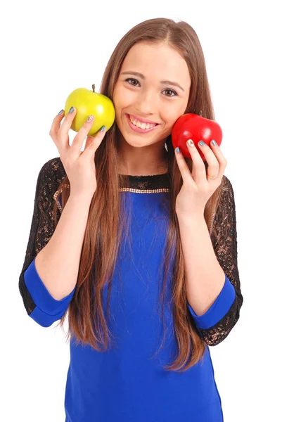 Молода дівчина тримає біля обличчя яблука — стокове фото