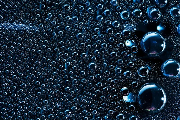 Drops of water  on  black background — Stock Photo, Image