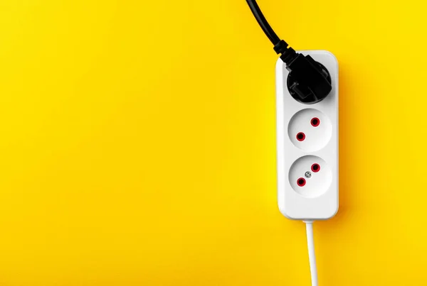 electric socket isolated on a yellow background