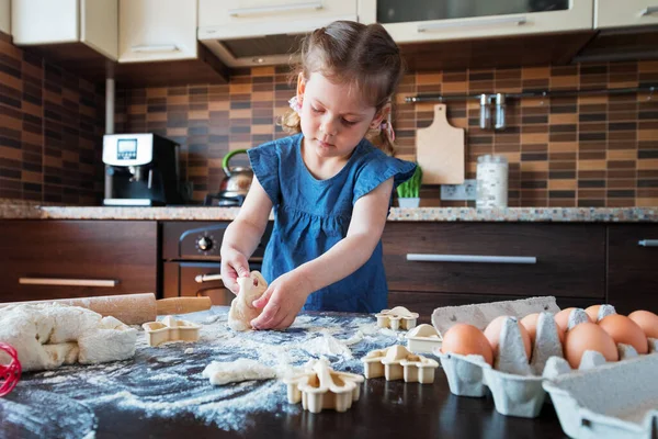 Mom and daughter prepare in the kitchen. The concept of a healthy diet and lifestyle. Family value.