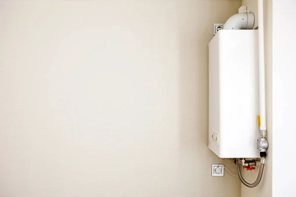 home gas boiler, water heater. Isolated gas stove on a gray background.