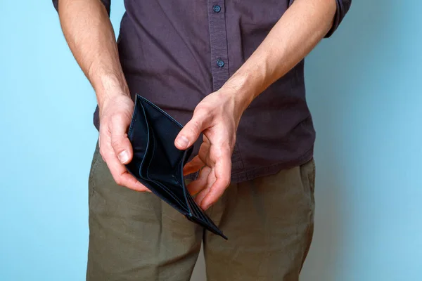 Portrait Half Man Empty Wallet His Hand Isolated Blue — Stock Photo, Image